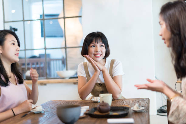 istock Three girls in the tea restaurant 1207193194