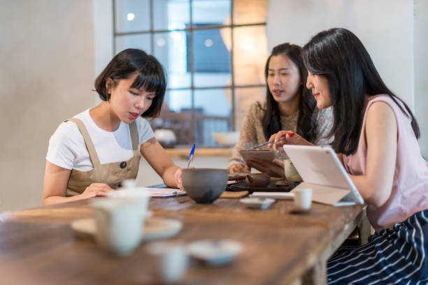 istock Three girls in the tea restaurant 1207193322