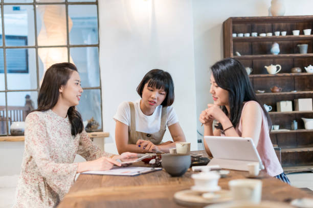 istock Three girls in the tea restaurant 1207193366