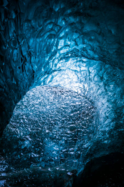 istock Ice cave in Iceland deep tunnel 1207193372