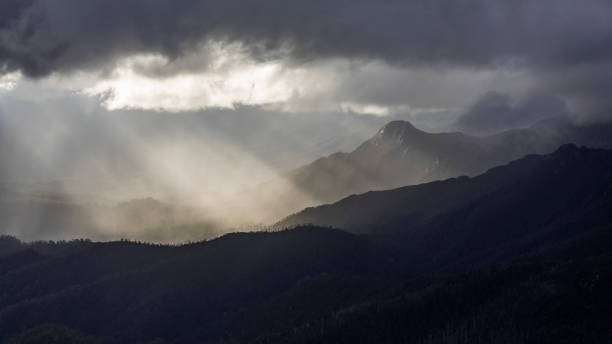 istock Heavenly light over dramatic mountains in Tasmania, Australia 1207193426