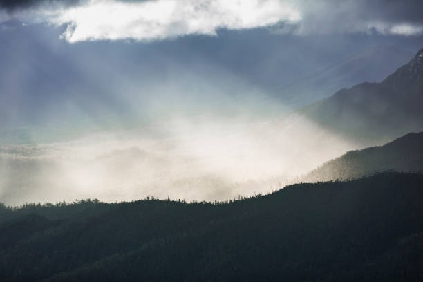istock Heavenly light over dramatic mountains in Tasmania, Australia 1207193435