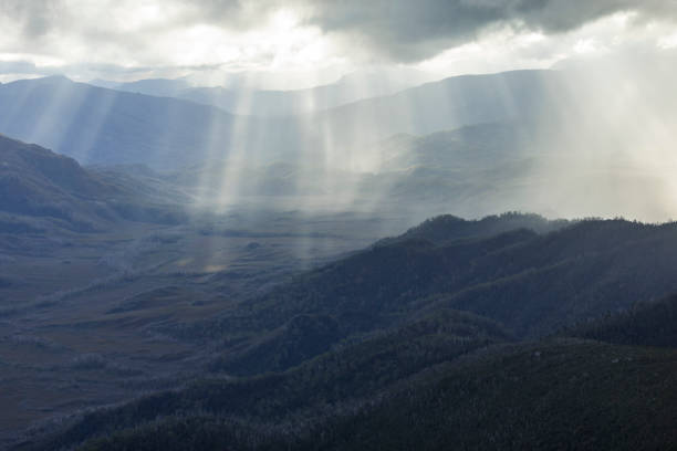 istock Heavenly light over dramatic mountains in Tasmania, Australia 1207193437