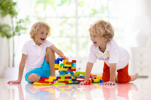 istock Child playing with toy blocks. Kids play. 1207202510