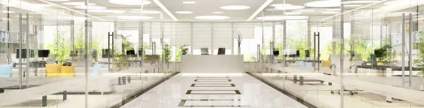 Photo of Interior design of large spacious office with glass partitions