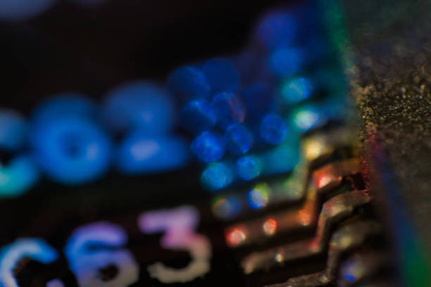 istock Extreme close up of graphic card light spectrum 1207203979