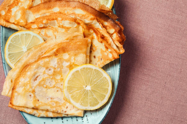 istock Shrove Tuesday pancakes with lemon 1207208169