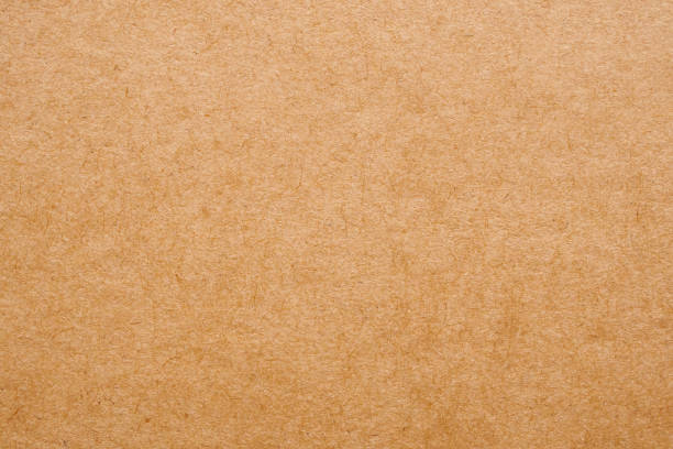 istock Brown paper eco recycled kraft sheet texture cardboard background 1207208317