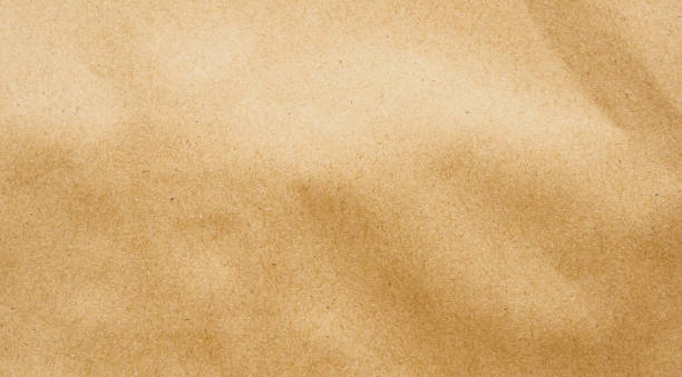 istock Brown paper eco recycled kraft sheet texture cardboard background 1207208516