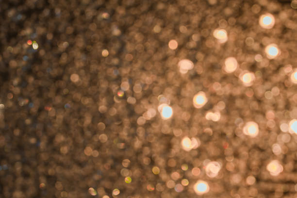 istock Bokeh golden yellow tones from light vintage celebrations as abstract background. 1207209017
