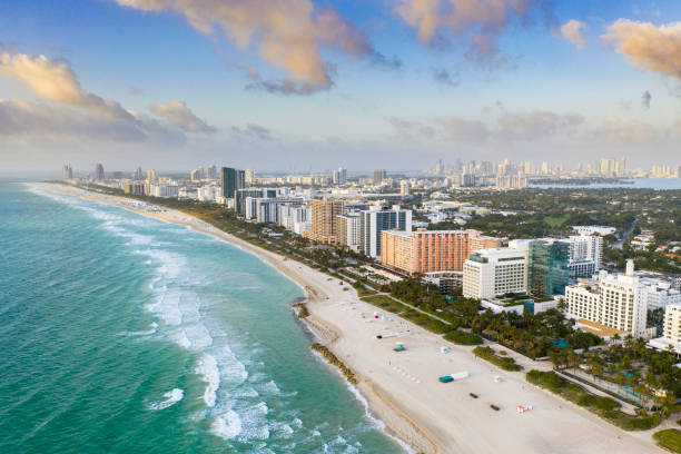 Beautiful Miami, Florida, USA Aerial view of a beautiful morning in Miami Beach with Downtown district in the background, Florida, USA miami beach stock pictures, royalty-free photos & images