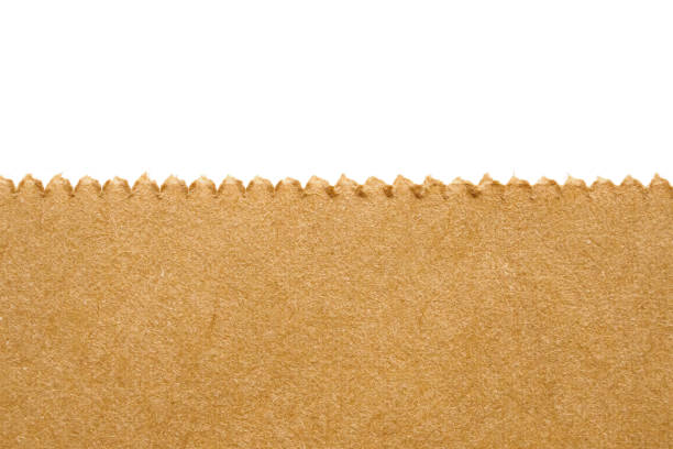istock Close up brown paper bag texture isolated on white background 1207210895