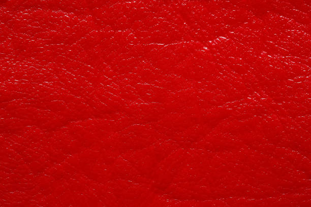 istock Spectacular shiny red dermatin texture. Superlative dark leatherette texture. 1207210998