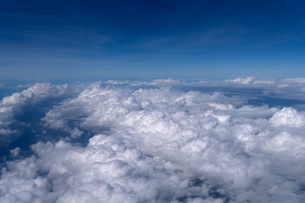 istock Beautiful aerial view above clouds. 1207211579