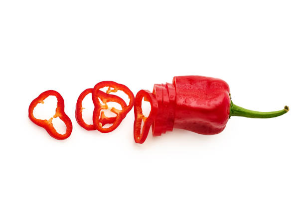 istock Sliced red bell pepper isolated on white background 1207215687
