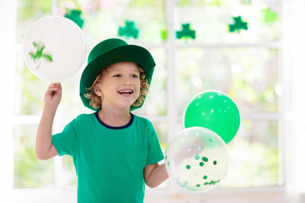 istock Kids celebrate St Patrick Day. Irish holiday. 1207217111