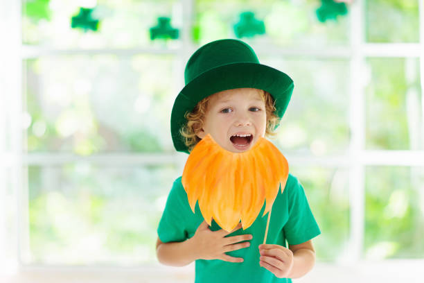 istock Kids celebrate St Patrick Day. Irish holiday. 1207217703