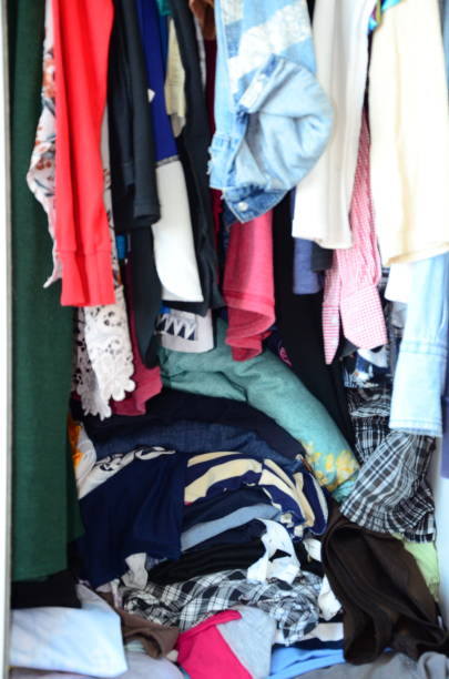 istock Wardrobe full of clothes 1207223302
