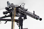 Black assault rifle weapon loaded with ammunition.
