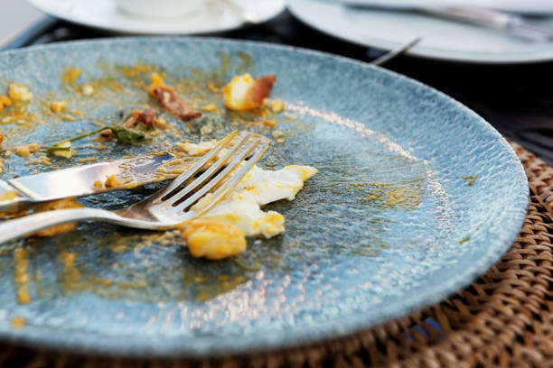istock Smeared egg remains of breakfast in close-up 1207231598