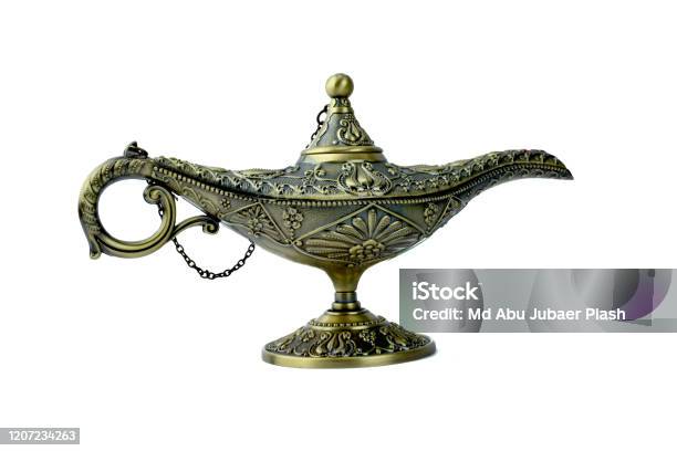 Magical Genie Lamp Of Aladdina Antique Golden Colored Lamp Displayed On A Background Stock Photo Download Image Now - iStock