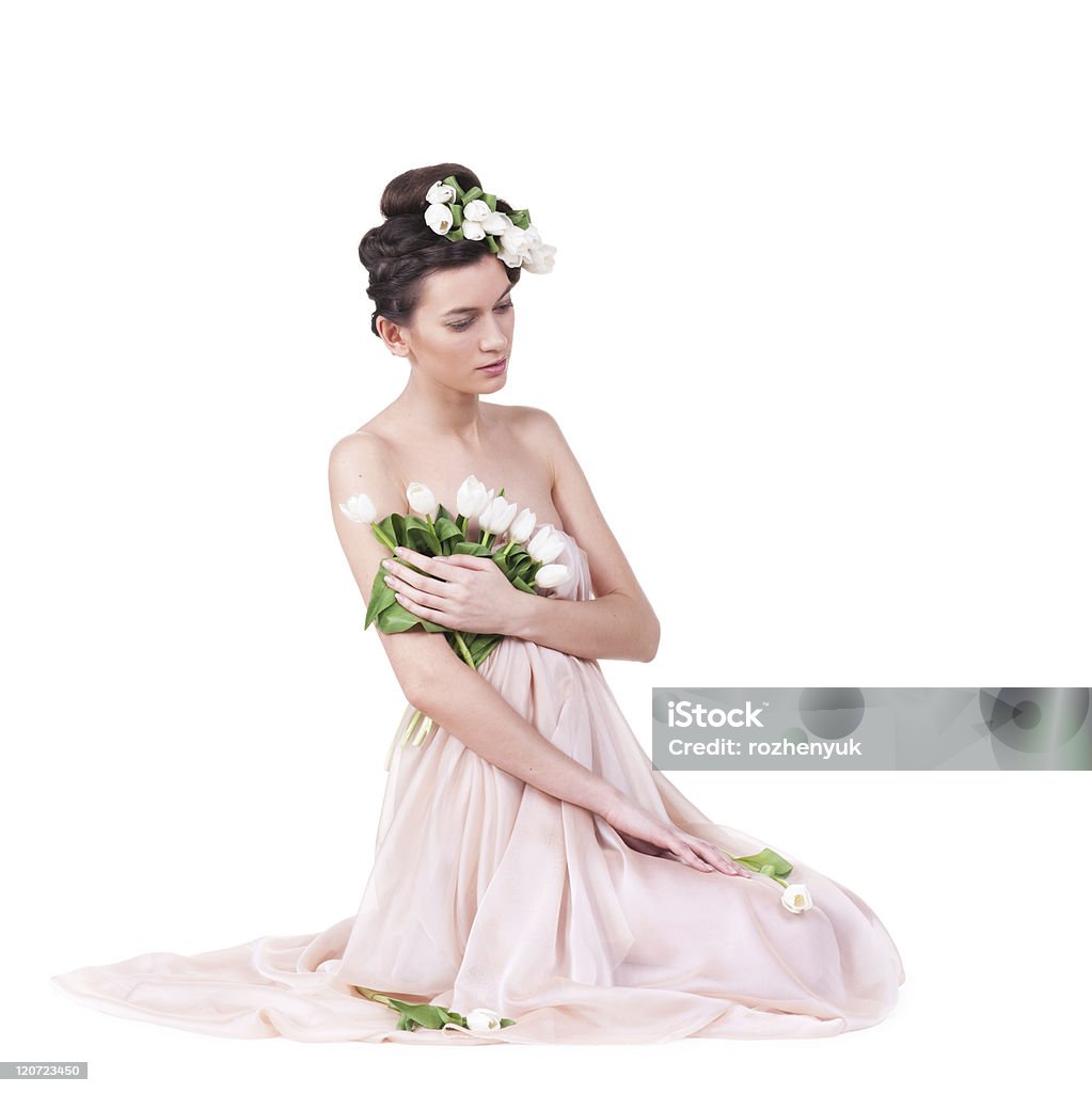 Pretty young woman with tulips Pretty young woman with spring tulips isolated white 20-29 Years Stock Photo