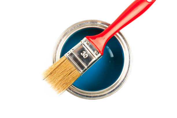 istock Can with blue  paint and brush isolated on white background top view - Image 1207236927