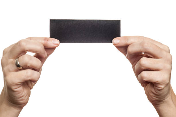 istock Woman holding blank card 1207237182