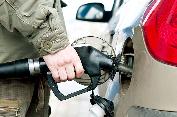 istock Man pumping fuel  in to the tank 120723961