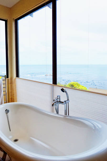 istock Bathtub with unbeatable view over the sea 1207240341