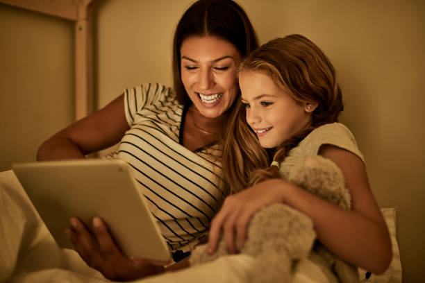 istock Bedtime turned into the best time for her 1207240351