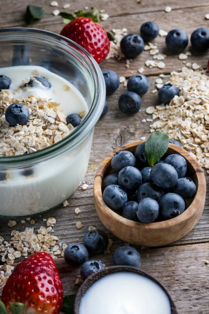 istock Strawberries, blueberries, oat flakes and yoghurt 1207245113