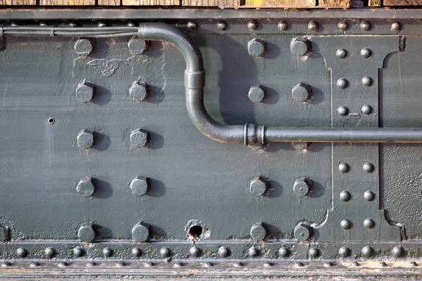 Steel bridge construction closeup with rivets and bolts Old steel bridge construction closeup with rivets and bolts in the Netherlands dordrecht photos stock pictures, royalty-free photos & images