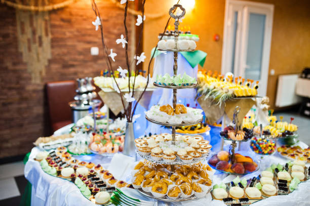 istock Dessert table of delicious sweets on wedding reception. 1207248315