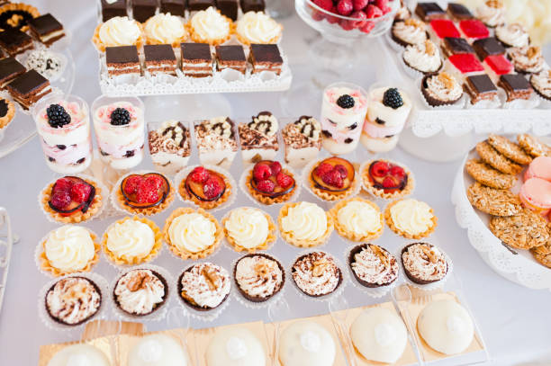istock Dessert table of delicious sweets on wedding reception. 1207248344
