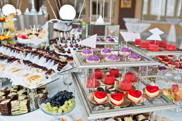 istock Dessert table of delicious sweets on wedding reception. 1207248455
