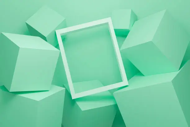 Abstract green background texture with geometric shape. 3d cube wall. Minimal mockup with white picture frame and green pastel podium scene concept. 3d render design for display product on website.