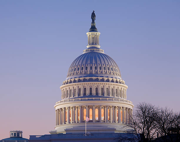 istock Sunrise behind the dome of Capitol in DC 120725248