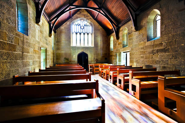 istock Old looking church room illuminated with sunlight 1207254701