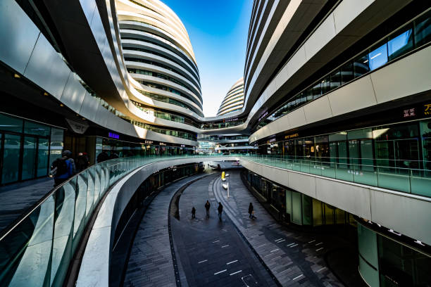 Beijing, China-January 11, 2020: Wangjing Yinhe SOHO Building in the east of Beijing, a complex of three curved asymmetric skyscrapers, located between central Beijing and Beijing Capital International Airport. Galaxy SOHO was designed by Zaha Hadid Architects. Contains office, retail and entertainment venues.