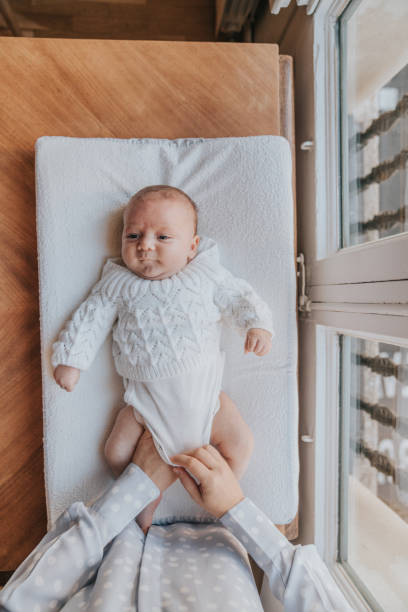 istock A top view of a newborn baby in a changing table 1207259613