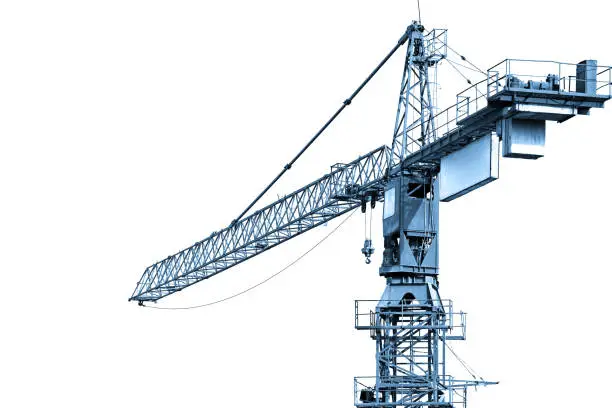 Photo of Blue toned construction crane working