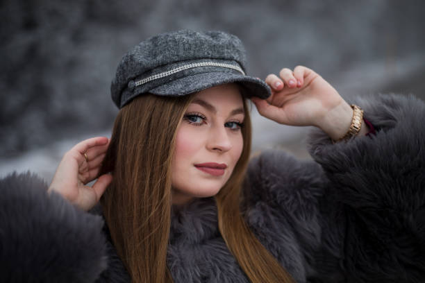 istock Young woman enjoys cold winter day in mountains 1207262643