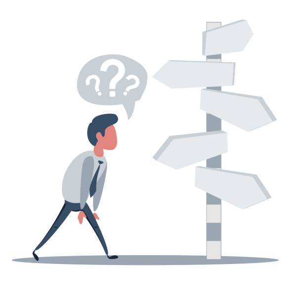 istock Right direction. A businessman looks at arrows pointing to many directions 1207263076