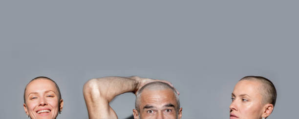 istock Funny bald skinhead couple 1207264443