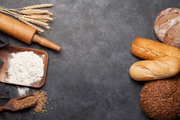 istock Various bread with wheat, flour and cooking utensils 1207264798
