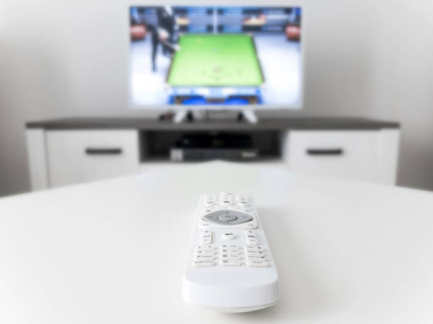 istock TV with white screen on a stand in the room. 1207265649