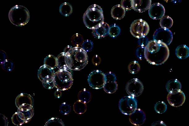 istock Blurred of Bubble on black background, Bokeh with background. 1207265728
