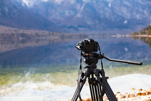 Camera on Filming Tripod By a Lake in Slovenia.