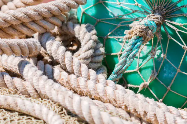 Photo of Beautiful marine background with buoy and ropes.